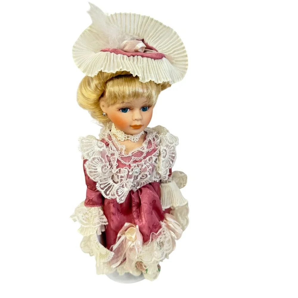 Victoriann Porcelain Doll Collector 11